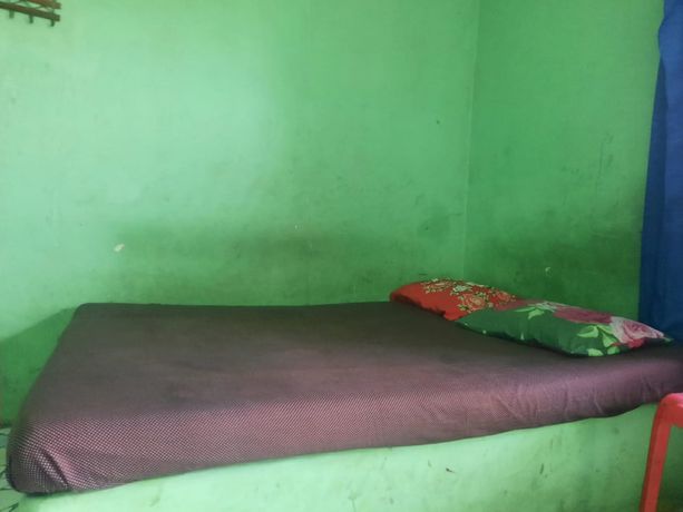 Imagen de la habitación del Hotel OYO Life 93023 Kost Bulan Karawang. Foto 3