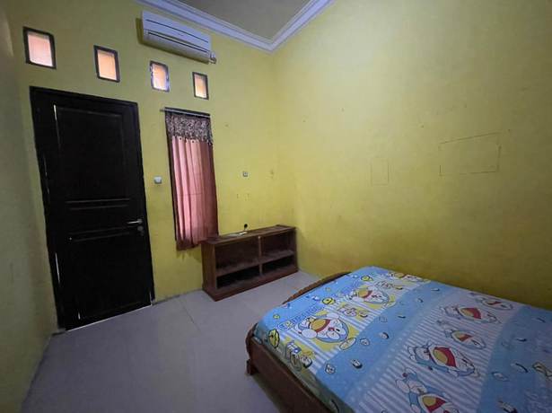 Imagen de la habitación del Hotel OYO Life 93036 Eddy Homestay Syariah. Foto 12