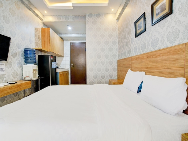 Imagen de la habitación del Hotel OYO Life 93086 Apartemen The Suite Metro By Abbah Property. Foto 8