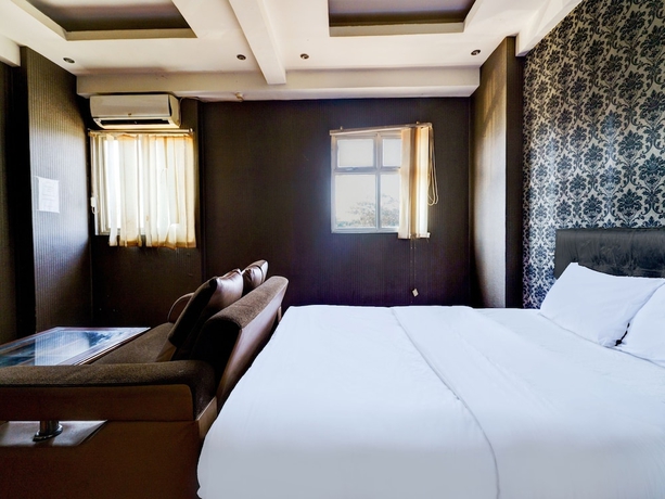 Imagen de la habitación del Hotel OYO Life 93086 Apartemen The Suite Metro By Abbah Property. Foto 9