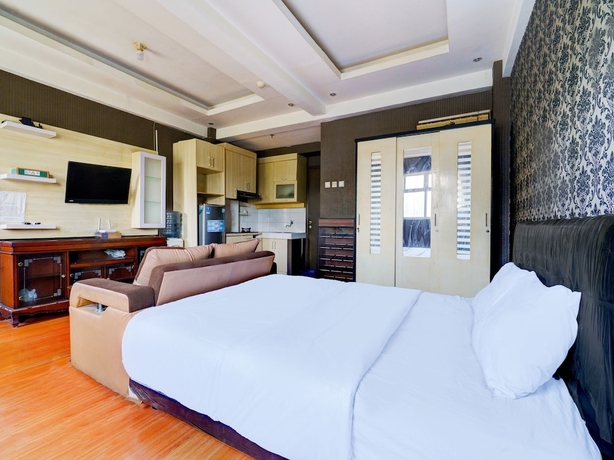 Imagen de la habitación del Hotel OYO Life 93086 Apartemen The Suite Metro By Abbah Property. Foto 10