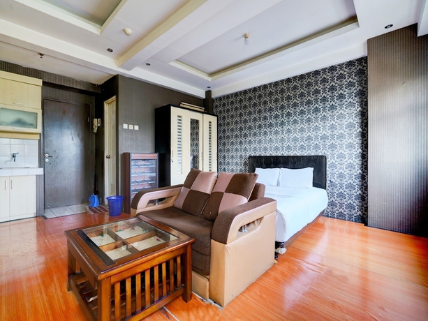 Imagen de la habitación del Hotel OYO Life 93086 Apartemen The Suite Metro By Abbah Property. Foto 11