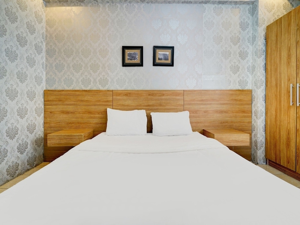 Imagen de la habitación del Hotel OYO Life 93086 Apartemen The Suite Metro By Abbah Property. Foto 12