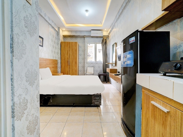 Imagen de la habitación del Hotel OYO Life 93086 Apartemen The Suite Metro By Abbah Property. Foto 14