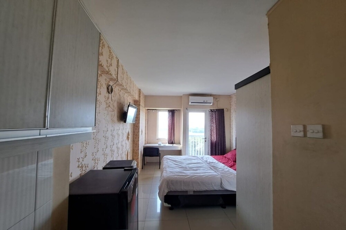 Imagen de la habitación del Hotel OYO Life 93106 Apartement Grand Sentraland By Andi. Foto 6