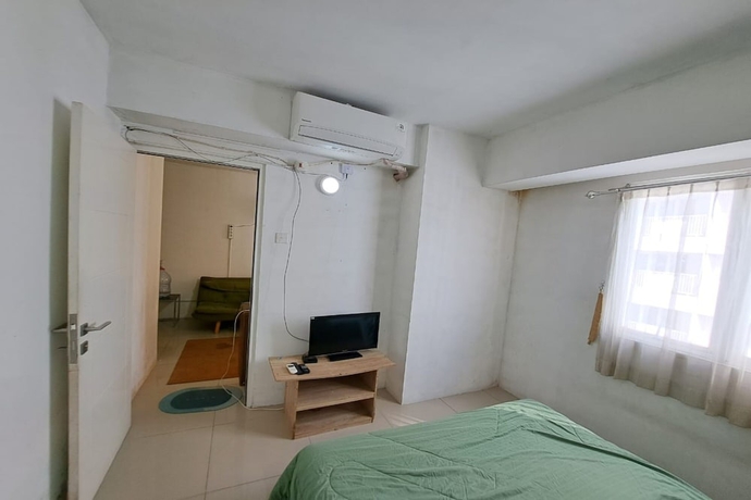 Imagen de la habitación del Hotel OYO Life 93106 Apartement Grand Sentraland By Andi. Foto 11