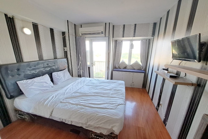 Imagen de la habitación del Hotel OYO Life 93106 Apartement Grand Sentraland By Andi. Foto 13