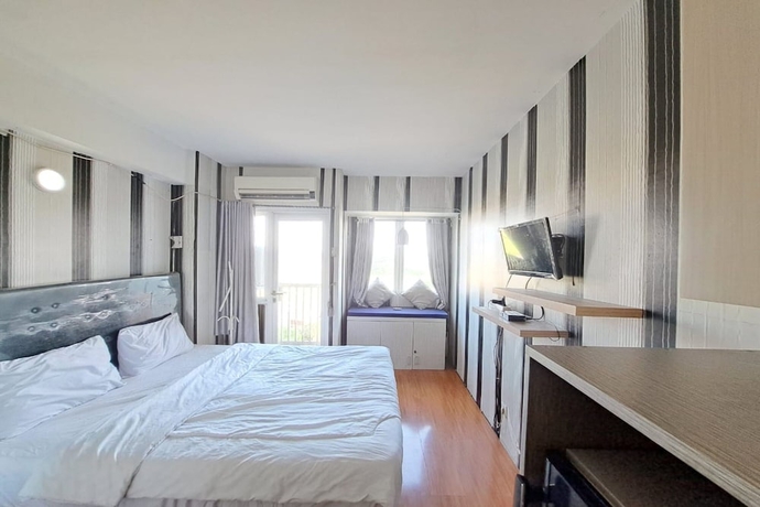 Imagen de la habitación del Hotel OYO Life 93106 Apartement Grand Sentraland By Andi. Foto 14