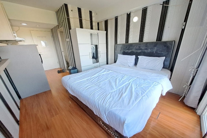 Imagen de la habitación del Hotel OYO Life 93106 Apartement Grand Sentraland By Andi. Foto 15