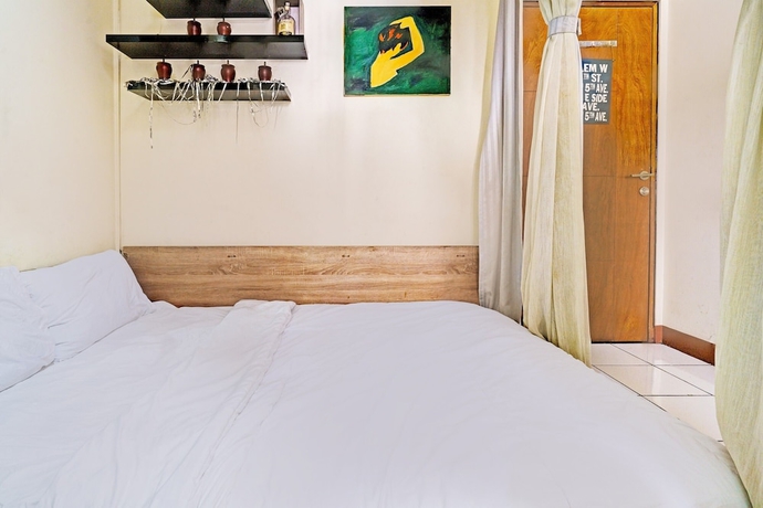 Imagen de la habitación del Hotel OYO Life 93120 Apartement Gateway Cicadas By Sarana Cipta Mahakarya. Foto 3