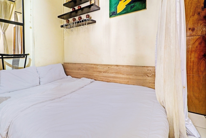 Imagen de la habitación del Hotel OYO Life 93120 Apartement Gateway Cicadas By Sarana Cipta Mahakarya. Foto 6