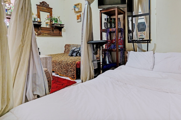 Imagen de la habitación del Hotel OYO Life 93120 Apartement Gateway Cicadas By Sarana Cipta Mahakarya. Foto 9