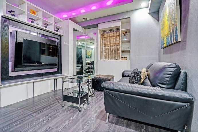 Imagen de la habitación del Hotel OYO Life 93120 Apartement Gateway Cicadas By Sarana Cipta Mahakarya. Foto 12