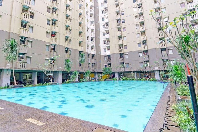 Imagen de la piscina del Hotel OYO Life 93120 Apartement Gateway Cicadas By Sarana Cipta Mahakarya. Foto 19