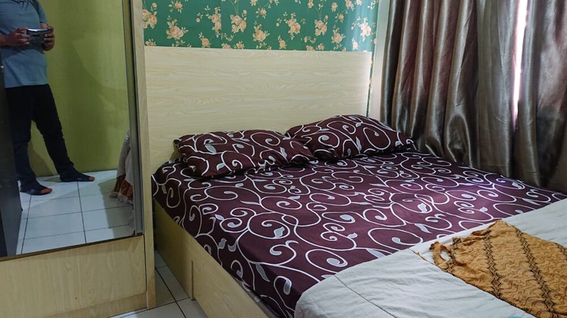 Imagen de la habitación del Hotel OYO Life 93139 Apartemen Grand Sentraland By Evi. Foto 6