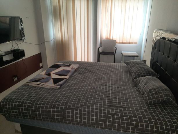 Imagen de la habitación del Hotel OYO Life 93139 Apartemen Grand Sentraland By Evi. Foto 11