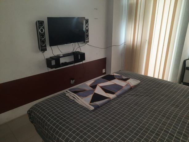 Imagen de la habitación del Hotel OYO Life 93139 Apartemen Grand Sentraland By Evi. Foto 12