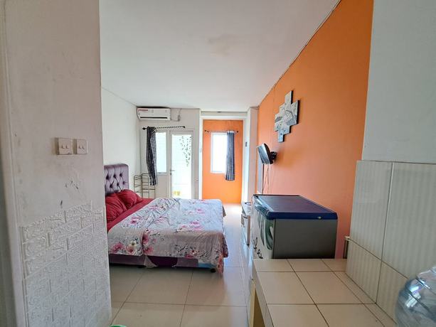 Imagen de la habitación del Hotel OYO Life 93139 Apartemen Grand Sentraland By Evi. Foto 14