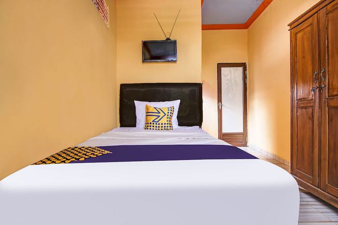 Imagen de la habitación del Hotel OYO Life 93154 White Kos Jenggala. Foto 5