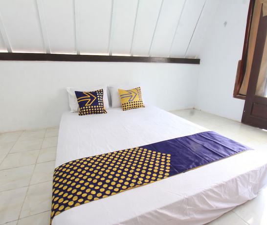 Imagen de la habitación del Hotel OYO Life 93154 White Kos Jenggala. Foto 6