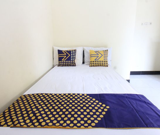 Imagen de la habitación del Hotel OYO Life 93155 Wisma Sarah. Foto 3