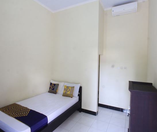 Imagen de la habitación del Hotel OYO Life 93155 Wisma Sarah. Foto 5