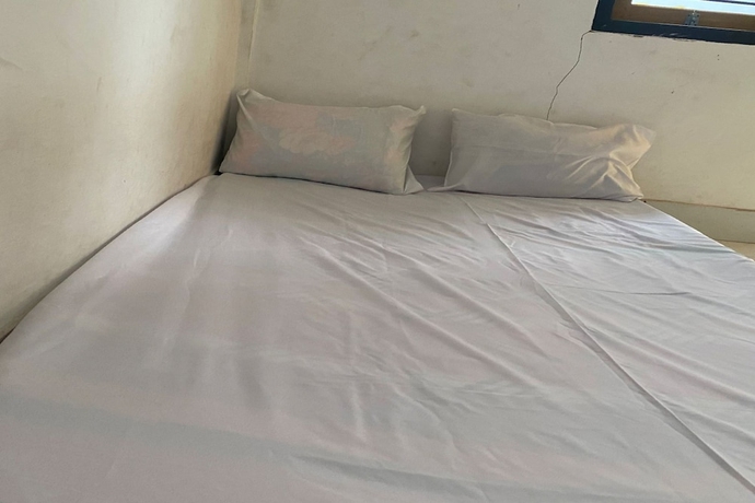 Imagen de la habitación del Hotel OYO Life 93156 Rumah Kosan. Foto 10