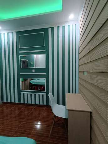 Imagen de la habitación del Hotel OYO Life 93158 Kost Asaka. Foto 12