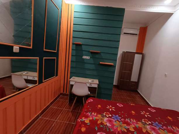 Imagen de la habitación del Hotel OYO Life 93158 Kost Asaka. Foto 13