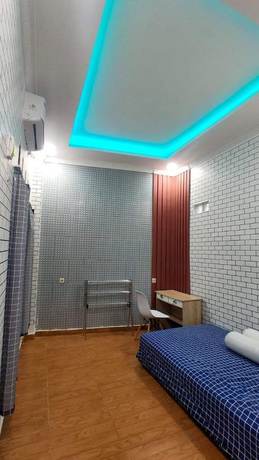 Imagen de la habitación del Hotel OYO Life 93158 Kost Asaka. Foto 16