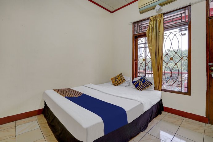 Imagen de la habitación del Hotel OYO Life 93164 Pacific Alam Sutra. Foto 15