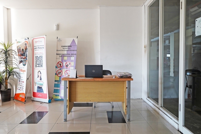 Imagen de los interiores del Hotel OYO Life 93170 Apartement Gateway Cicadas By Mr Pro. Foto 17