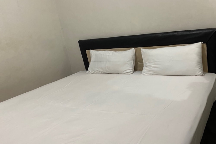 Imagen de la habitación del Hotel OYO Life 93256 Kos Meninting. Foto 6