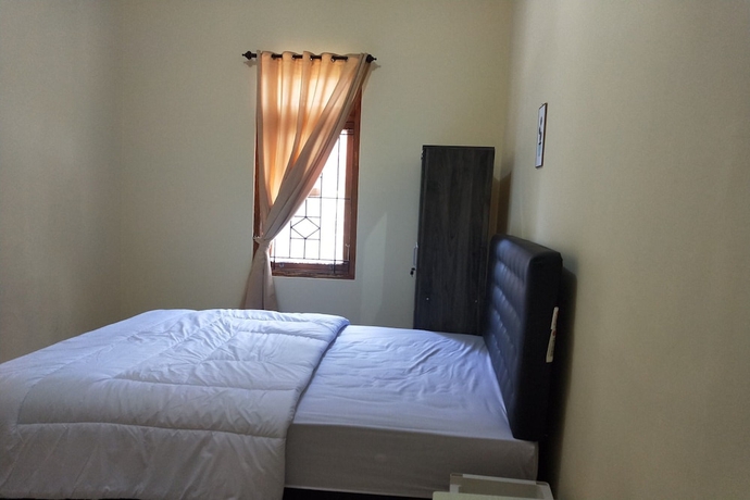 Imagen de la habitación del Hotel OYO Life 93257 Kos Anugerah. Foto 3