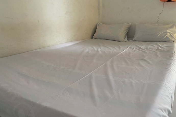 Imagen de la habitación del Hotel OYO Life 93257 Kos Anugerah. Foto 7