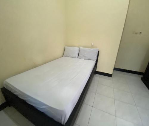 Imagen de la habitación del Hotel OYO Life 93258 Kos Sahabat. Foto 20