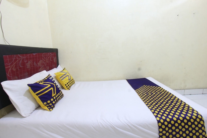 Imagen de la habitación del Hotel OYO Life 93260 Bale Kosan. Foto 3