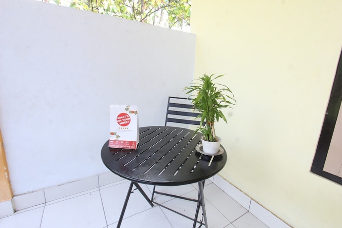 Imagen de los interiores del Hotel OYO Life 93260 Bale Kosan. Foto 17
