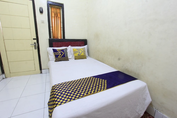Imagen de la habitación del Hotel OYO Life 93260 Bale Kosan. Foto 11