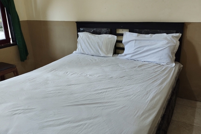 Imagen de la habitación del Hotel OYO Life 93265 Kos Cendana Seruni Raya. Foto 7