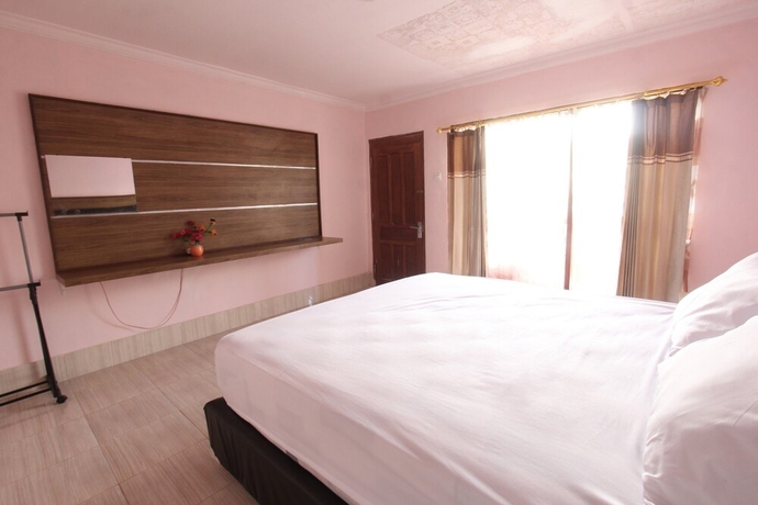 Imagen de la habitación del Hotel OYO Life 93284 Kos Cendana Raya. Foto 9
