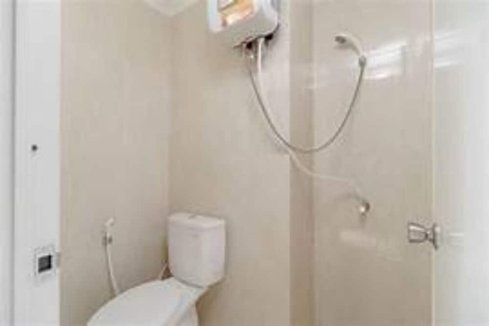 Imagen de la habitación del Hotel OYO Life 93374 Andira Inn. Foto 9