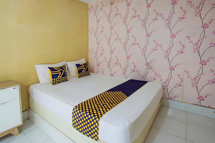 Imagen de la habitación del Hotel OYO Life 93399 Kos Batulayar. Foto 9