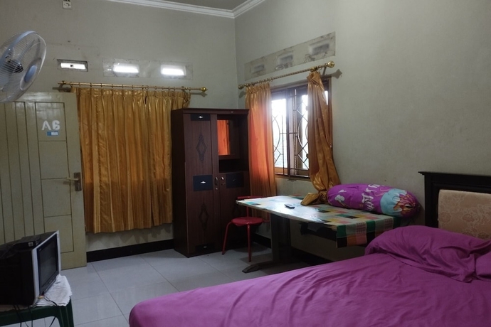 Imagen de la habitación del Hotel OYO Life 93403 Penginapan Adinda. Foto 5