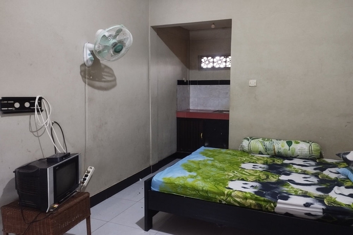 Imagen de la habitación del Hotel OYO Life 93403 Penginapan Adinda. Foto 6