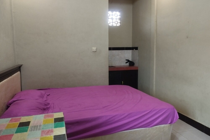Imagen de la habitación del Hotel OYO Life 93403 Penginapan Adinda. Foto 10
