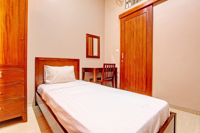 Imagen de la habitación del Hotel OYO Life 93497 Griya Kost Rr. Foto 7