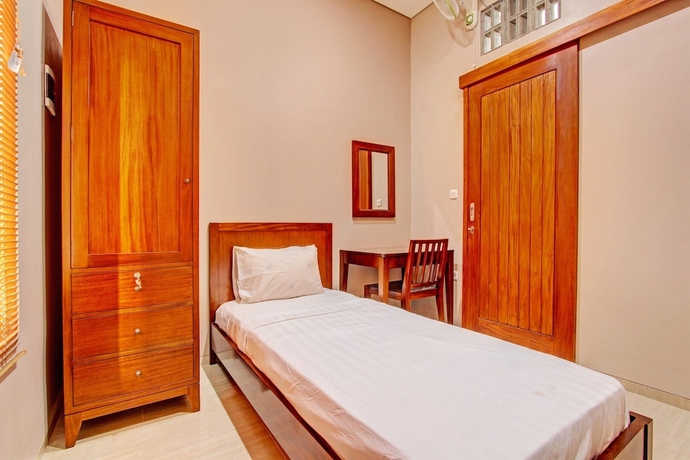 Imagen de la habitación del Hotel OYO Life 93497 Griya Kost Rr. Foto 8