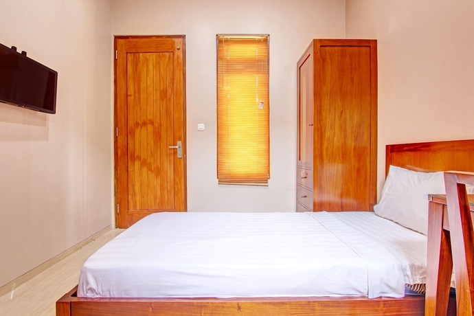Imagen de la habitación del Hotel OYO Life 93497 Griya Kost Rr. Foto 9