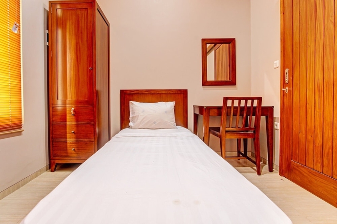 Imagen de la habitación del Hotel OYO Life 93497 Griya Kost Rr. Foto 11